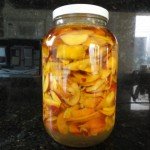 Ingredients for Homemade Peach Liueur Brought Together to Steep for 3 Weeks