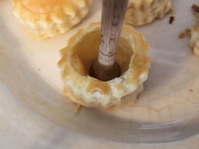 Making the holes for the filling Making the holes for the filling 640x480 Coronation chicken vol au vents