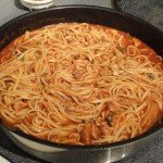 Linguine with Red Clam Sauce Finishing Off in a Skillet