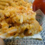 Saltine Cracker Topped with Crawfish Boudin and Hot Sauce