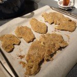 Fully cooked baked breaded chicken cutlets fresh from the oven