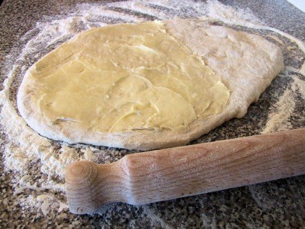 Dough with first layer of lard and butter