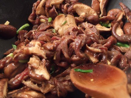 Stir frying the Mongolian beef