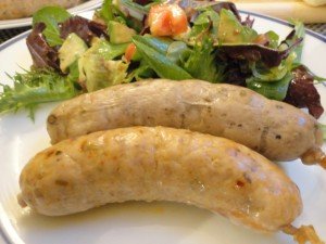 Homemade Italian Sausage with Salad in Background