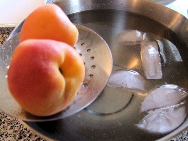 Drop the peaches in an ice bath