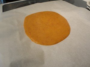 2 Cups of Peach Puree Poured on the Parchment Paper