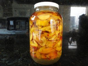 Ingredients for Homemade Peach Liueur Brought Together to Steep for 3 Weeks