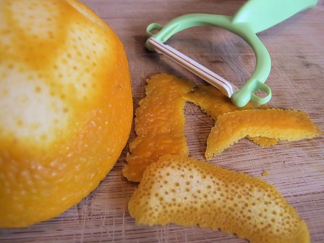 Removing the peel from an orange