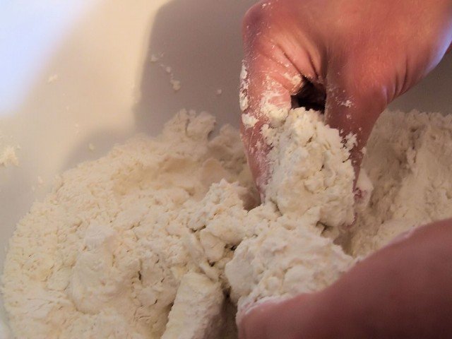 Rubbing the butter into the flour