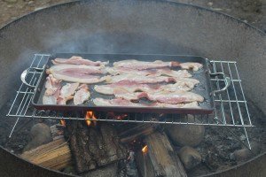 Bacon Sizzling on the Camp Fire