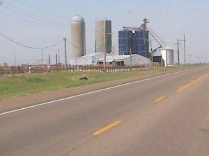 Farm with grain silos on US Route 400 in Kansas