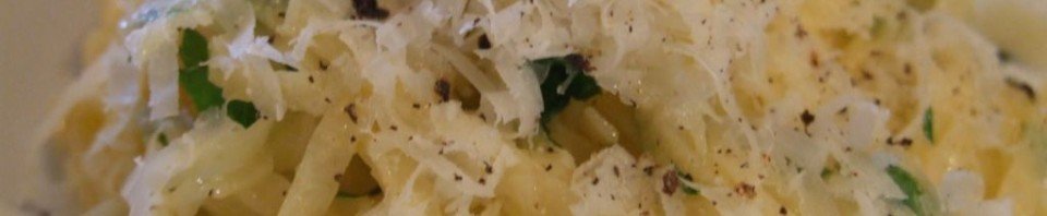 Fresh homemade semolina pasta served with olive oil, black pepper and grated Parmesan