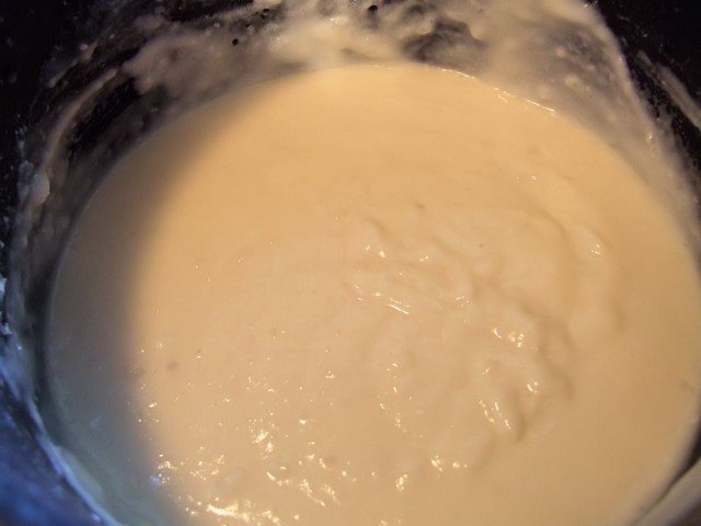 Mixing the flour and yeast with the potato slurry