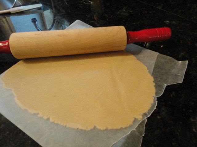 Pinwheel Cookie Dough Rolled Out between Wax Paper