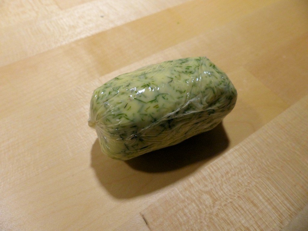 Wrapped lemon and dill flavored butter